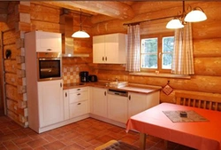 Hood for the kitchen of a wooden house photo