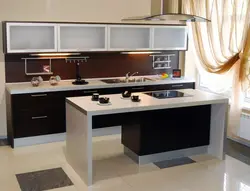 Photo of a kitchen with a set in the middle