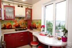 Photo Of A Kitchen With A Set In The Middle