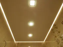 Photo of a floating stretch ceiling in the bathroom