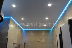 Photo of a floating stretch ceiling in the bathroom