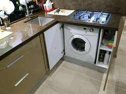 Mətbəxdə lavabo ilə paltaryuyan maşın foto