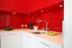 Gray kitchen with red apron photo