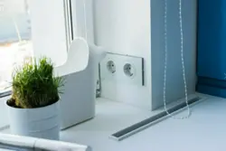 Sockets By The Window In The Kitchen Photo
