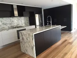 Kitchen white marble and wood photo