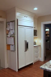 Refrigerator in the closet in the living room photo