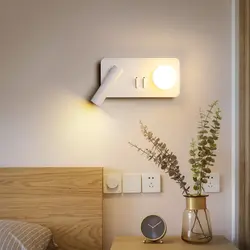 Sconce in the bedroom with a switch photo