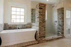 Brick shower in the bathroom photo