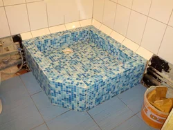 Brick shower in the bathroom photo