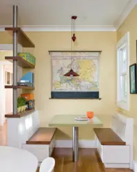 Cabinet above the table in the kitchen photo