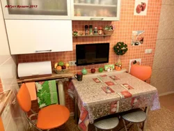 Cabinet above the table in the kitchen photo