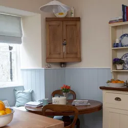 Cabinet above the table in the kitchen photo