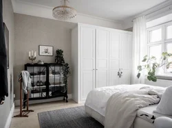 Wardrobes and wallpaper in the bedroom photo