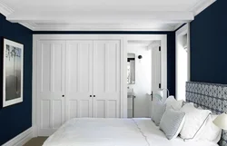 Wardrobes and wallpaper in the bedroom photo