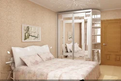 Wardrobes and wallpaper in the bedroom photo
