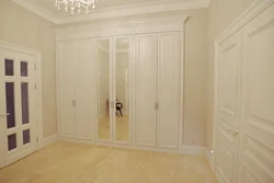 Built-in wardrobe in the hallway white photo