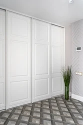 Built-In Wardrobe In The Hallway White Photo