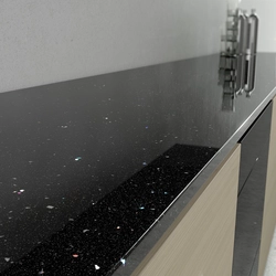 Photo of black artificial stone in the kitchen