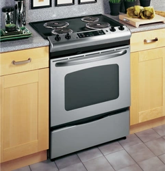 Electric stove with oven in the kitchen photo