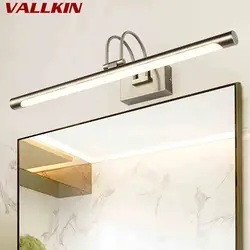 Bath sconce on the mirror photo