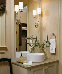 Bath sconce on the mirror photo