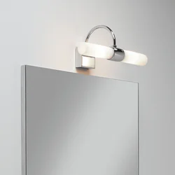 Bath sconce on the mirror photo
