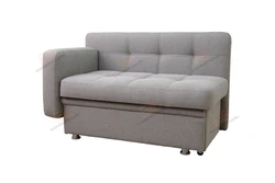 Couch in the kitchen with sleeping photo