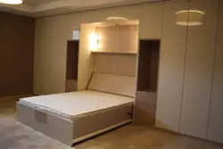 Bedroom built-in furniture with bed photo
