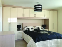Bedroom built-in furniture with bed photo
