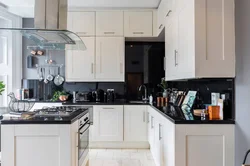 Light kitchen with black apron photo