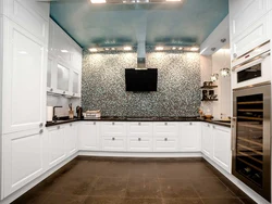 Light kitchen with black apron photo