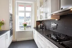 Light kitchen with black apron photo