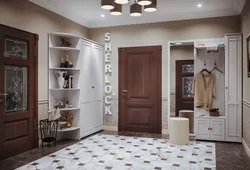 Light hallway with dark furniture photo