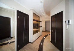 Light hallway with dark furniture photo