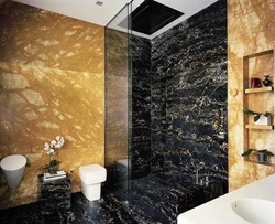 Bathtub with stone panels photo