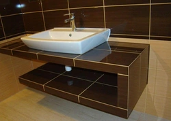 Bathroom cabinet made of tiles photo