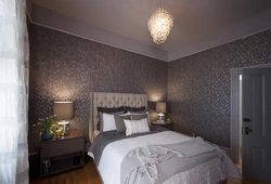 Dark wallpaper in a small bedroom photo