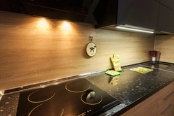 Photo of a kitchen with a chipboard apron