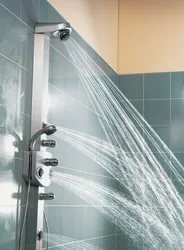 Photo of shower in bathtub with water