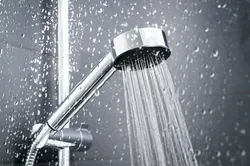 Photo of shower in bathtub with water