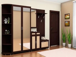 A lot of furniture cabinets for the hallway photo