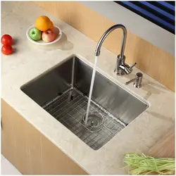 Faucet on the countertop in the kitchen photo