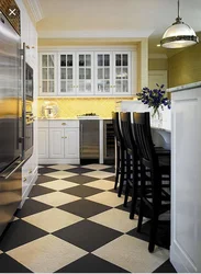 Black and white tiles kitchen floor photo