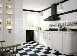 Black and white tiles kitchen floor photo