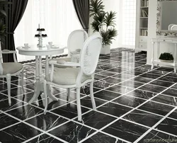 Black and white tiles kitchen floor photo