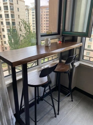 Photo of tables and chairs on the loggia