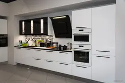 Black inclined hoods in the kitchen photo