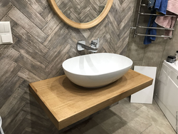 Wooden countertop in the bathroom photo design