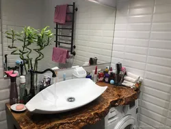 Wooden countertop in the bathroom photo design