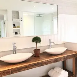 Wooden countertop in the bathroom photo design